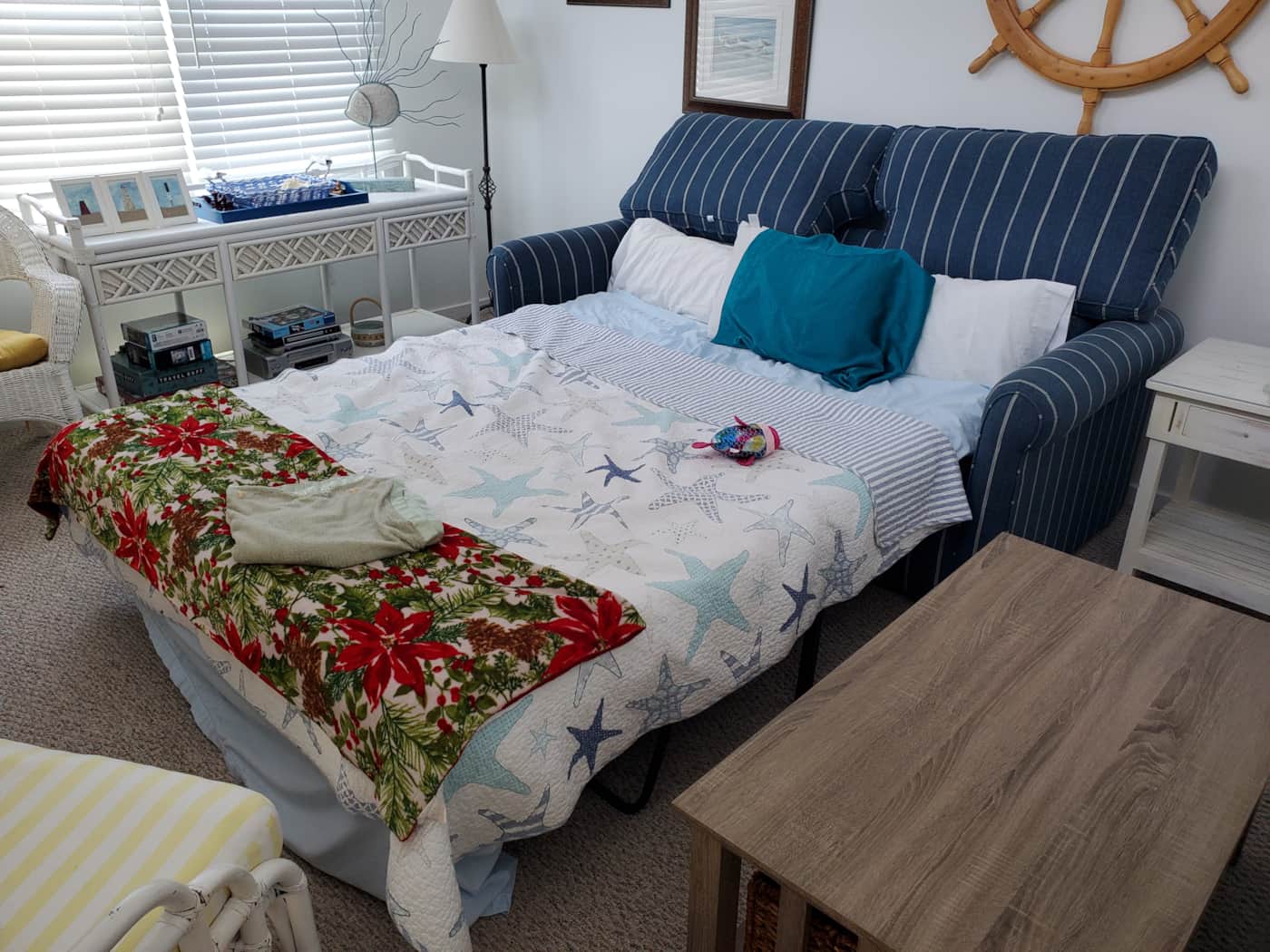 Queen sleeper sofa made up as a bed